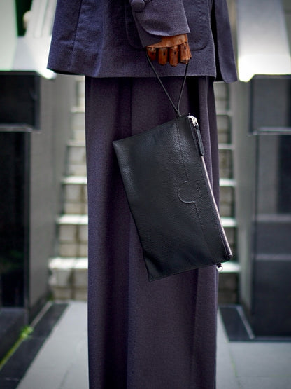 T MANILLA ENVELOPE